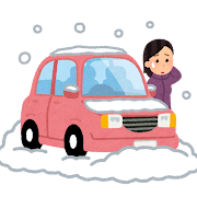 雪で立ち往生した女性のイメージ